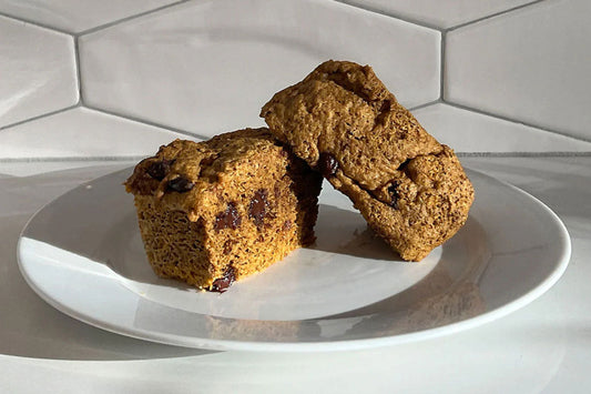 Pumpkin flax mug muffins on white plate